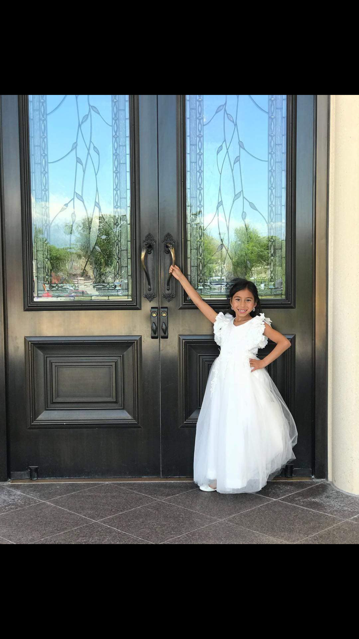 Girl at Temple Door